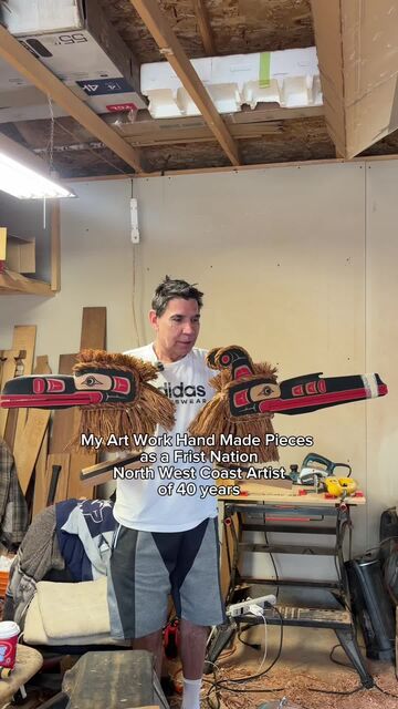 Ross Henderson with his carved and painted work
