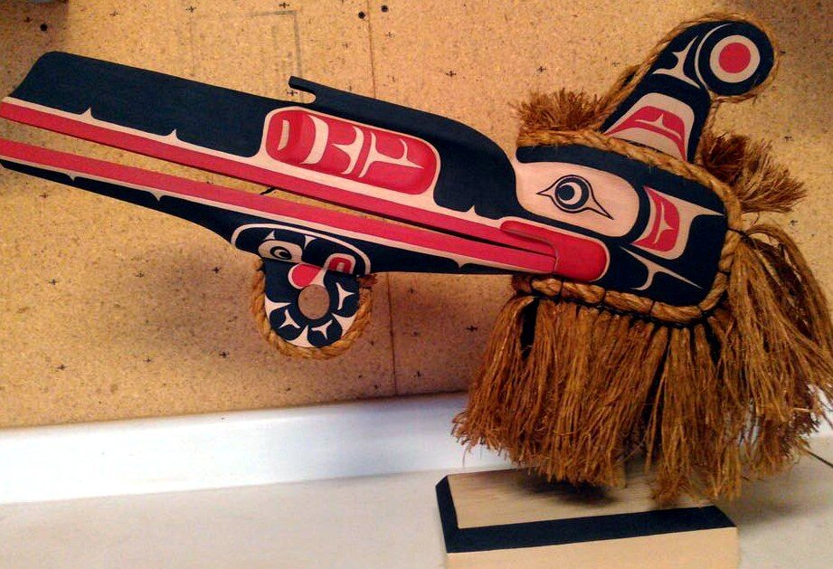 Raven mask, carved and painted red cedar with cedar bark