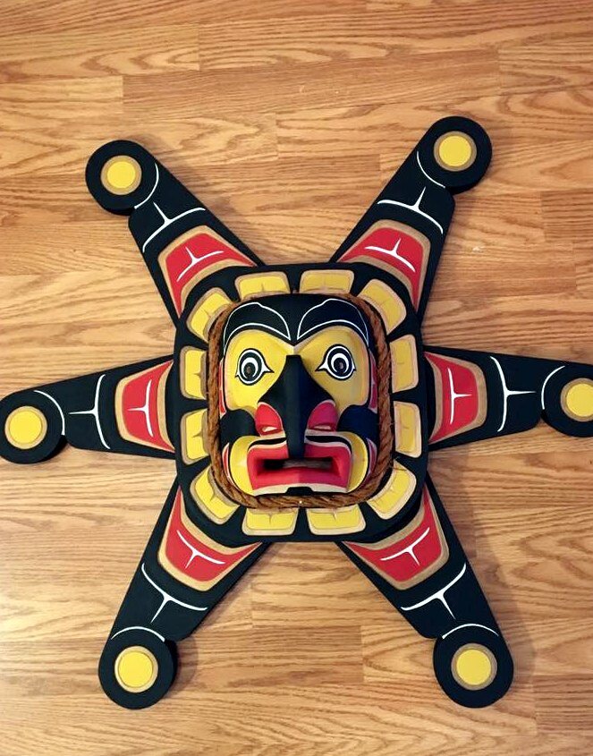Sun mask, carved and painted red cedar