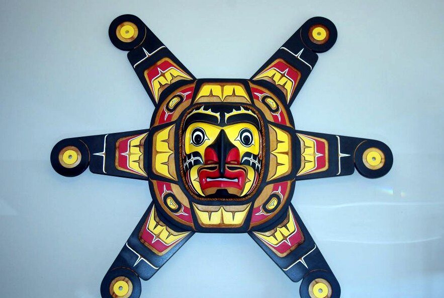 Sun mask, carved and painted red cedar